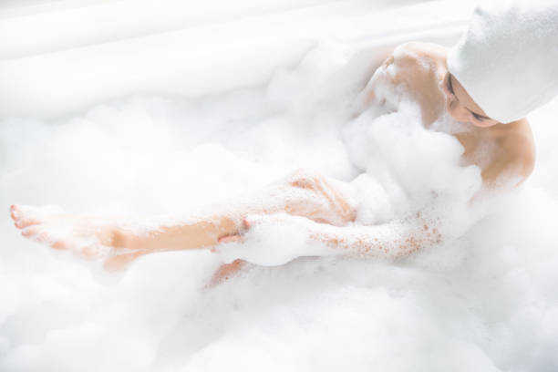 istock Women bathing in the bathtub she relaxing 820847548