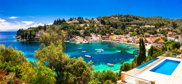 summer holiday in Greece - picturesque Loggos village in Paxos island tranquill vacations in small beautiful Greek islands. Paxos (Ionian islands) fishing village stock pictures, royalty-free photos & images