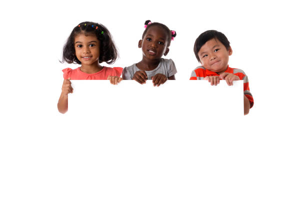 group of multiracial kids portrait with white board.isolated - preschooler childhood outdoors cheerful imagens e fotografias de stock
