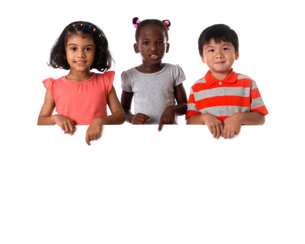 group of multiracial kids portrait with white board.isolated - preschooler childhood outdoors cheerful imagens e fotografias de stock