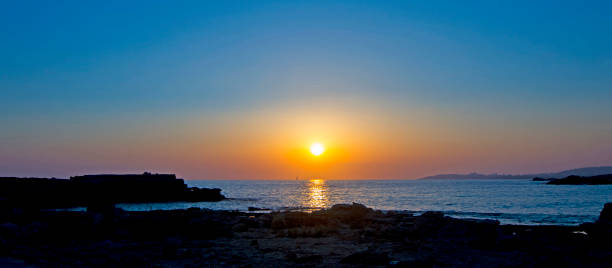istock Sunset landscape from sea coast 820853144