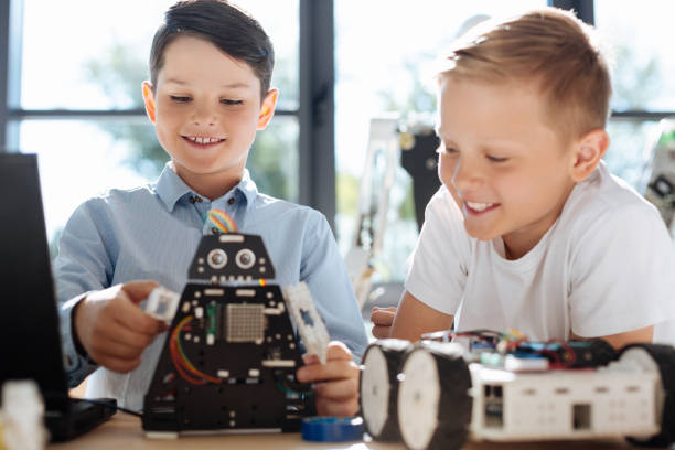 istock Inspired boy demonstrating the work of his robotic warrior 820856754