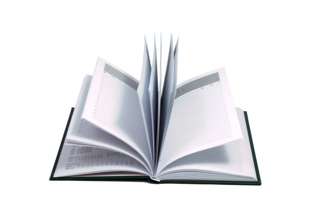 istock opened Notebook isolated on white background. Diary of a businessman. 820857048