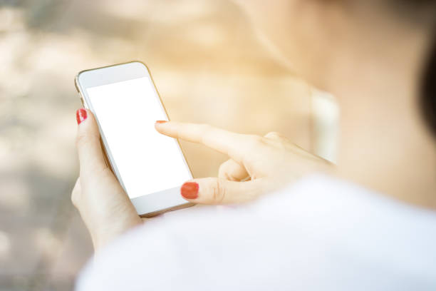 istock Asian woman are using smartphone in park.selective focus 820857988