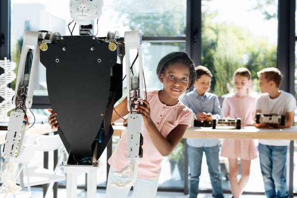 istock Pretty girl hugging a human robot from behind 820858108
