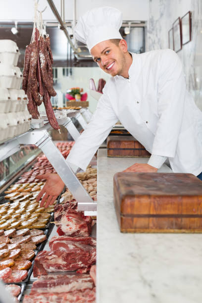 istock happy chief cooking fresh meat 820858676