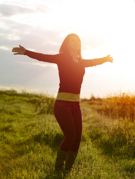 istock Beauty Girl Outdoors enjoying nature. 820859136