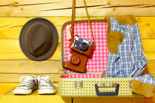 istock Retro travel accessories.Suitcase,camera,sneakers,hat. 820859174