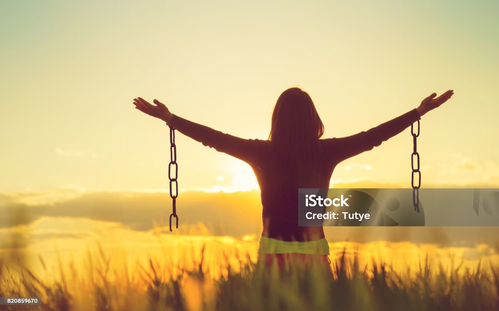 Woman feeling free in a beautiful natural setting. Freedom Stock Photo