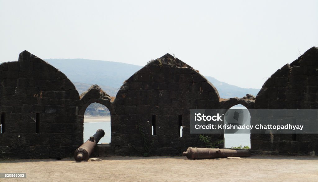 11th century cannon - Murud Janjira fort at Alibag, India Fort built in the ocean at Alibag, India Accidents and Disasters Stock Photo