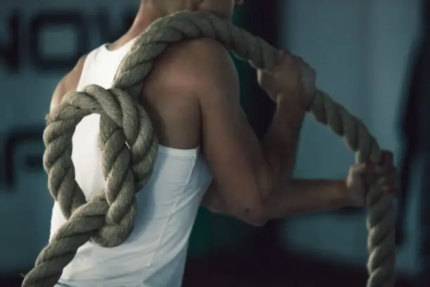 Photo of Man doing rope exercise