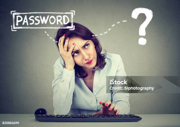 Desperate Young Woman Trying To Log Into Her Computer Forgot Password Stock Photo - Download Image Now