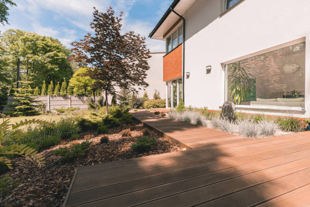 istock Wooden walkout deck in garden 820866716