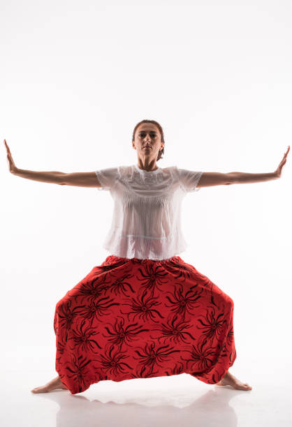 istock Young lady doing yoga and exercise over white background 820867738