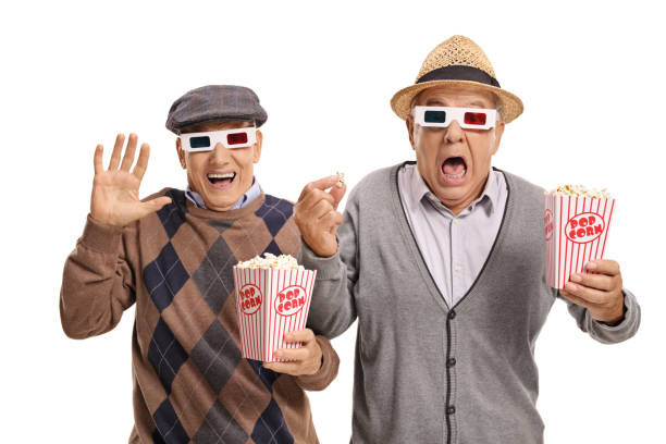 istock Terrified seniors with 3D glasses and popcorn 820869276