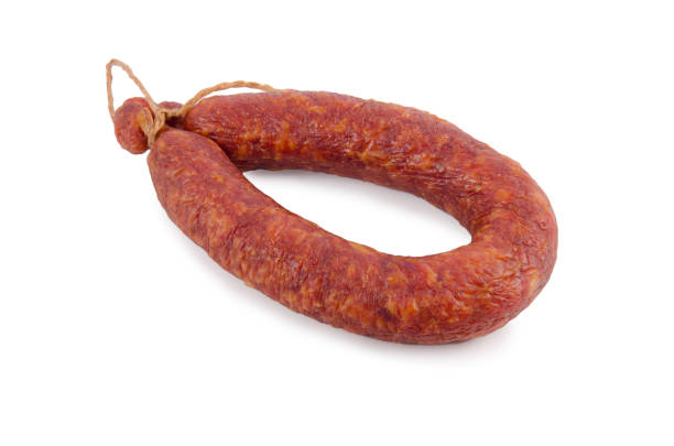 istock Smoked sausage isolated on white 820871012