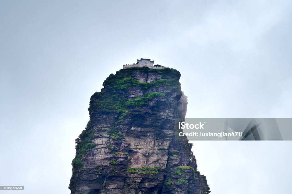 Climbing tourists in the steep mountain of Southwest China China,Guizhou province,Tongren City,Fanjing mountains(Mount Fanjing), Awe Stock Photo