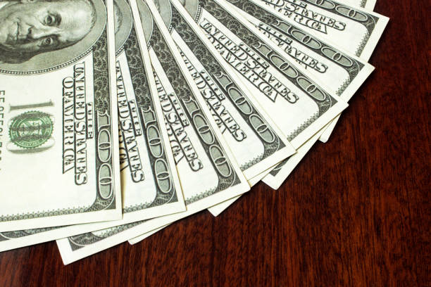 istock Money is rooted fan on the table, view from above 820875312
