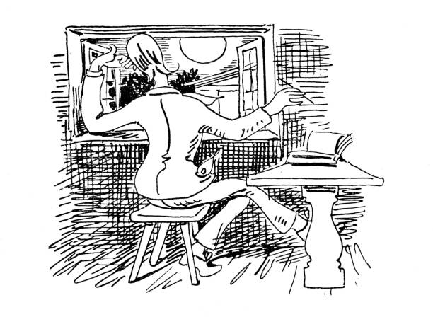 istock Life of an author: Man siting at table, thinking and writing and looking out of the window 820878260