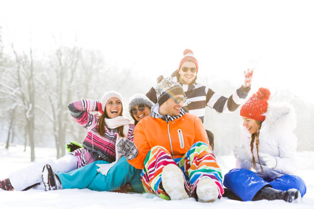istock Young friends having fun in snow 820882640