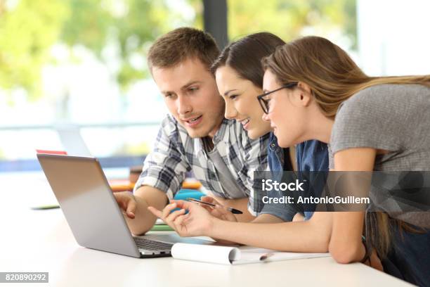 Students Learning Together On Line In A Classroom Stock Photo - Download Image Now - University Student, Computer, Student