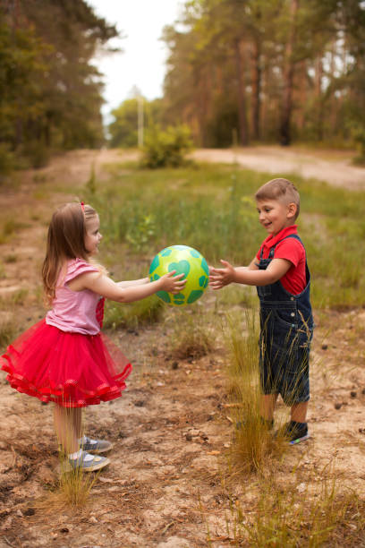 istock Funny children in the summer park 820891824