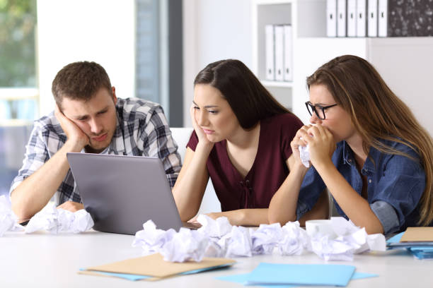istock Frustreted entrepreneurs trying to do a difficult job 820892526