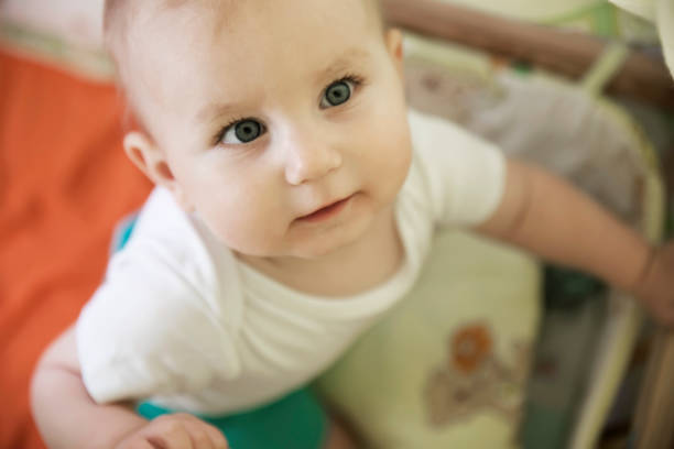istock cute little child looks with interest and a slightly open mouth. 820899502