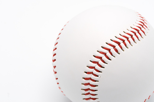 Isolated baseball on a white background and red stitching baseball.