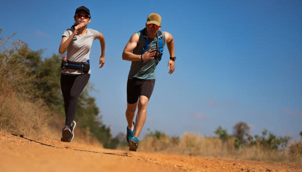 istock Couple Runner of Trail. He was running fast 820903298