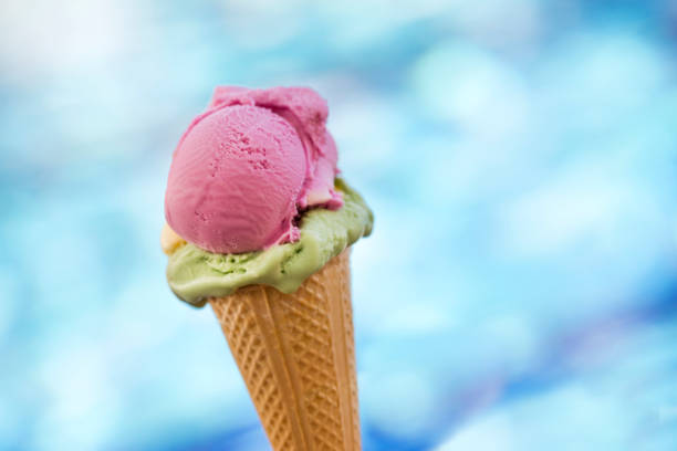 Strawberry and pistachio icecream cone