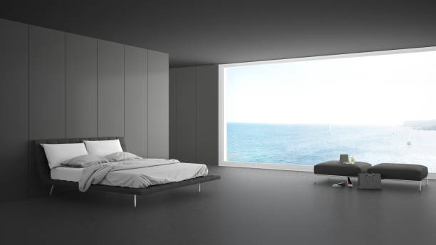 istock Minimalist bedroom with big window on sea panorama, white and gray interior design 820915212