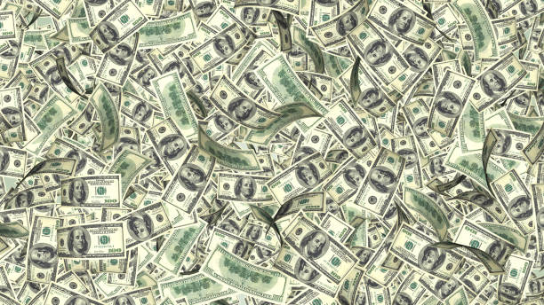 istock Rain from many falling dollars isolated on white background, finance concept 820919292