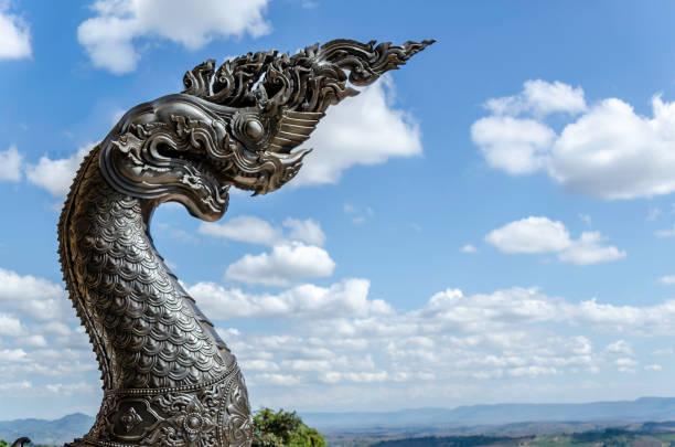 istock a Phayanak or Naga Statue on sky and cloud background, Thailand. 820932786