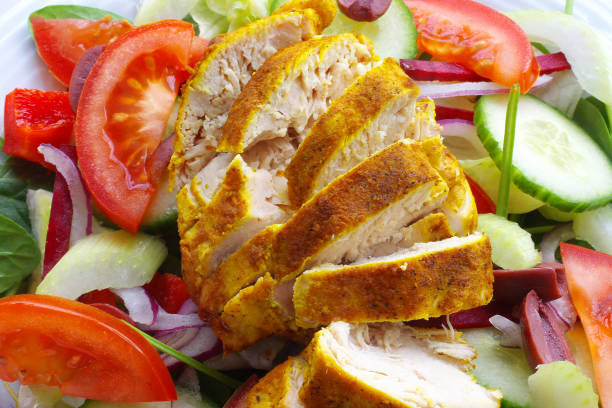 istock chicken breast sliced on salad dinner 820932820