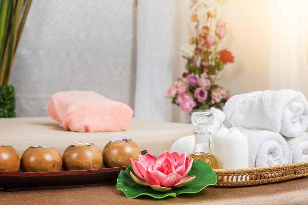 istock Massage item and Spa Oil in Basket on Bed 820933284