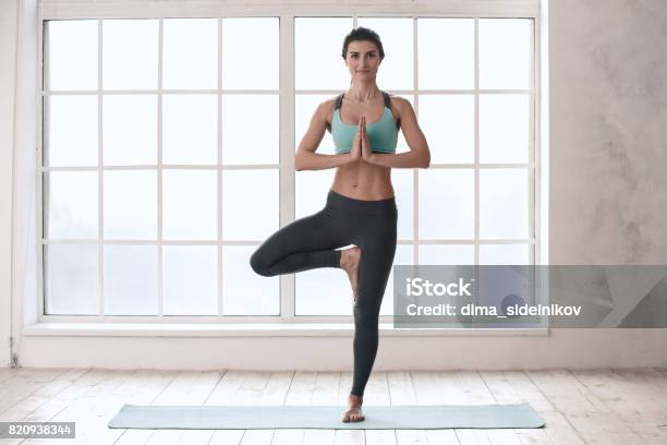 Young Woman Doing Yoga Pose Exercise Healthy Lifestyle Stock Photo - Download Image Now