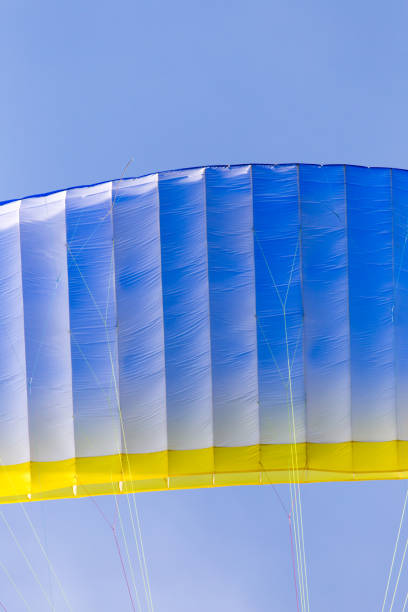 istock parachutist in the sky 820938552