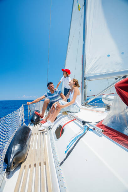 istock Father with adorable kids resting on yacht 820945206