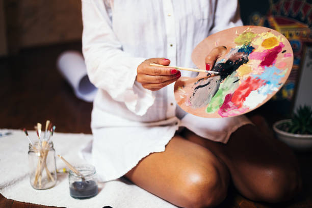 istock Beautiful artist enjoying her work 820953040