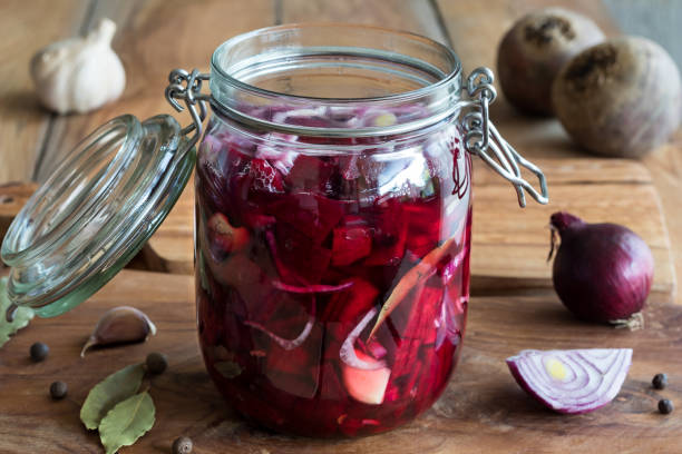 istock Preparation of fermented beets (beet kvass) in a glass jar 820956116