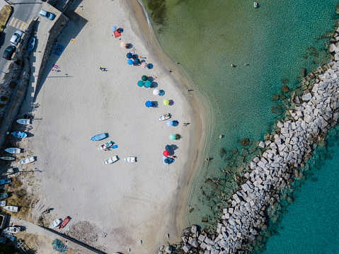 Aerial View Of A Beach With Canoes Boats And Umbrellas Pier Of Pizzo ...