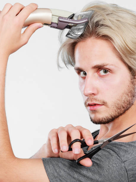 istock Man going to shave his long hair 820956724