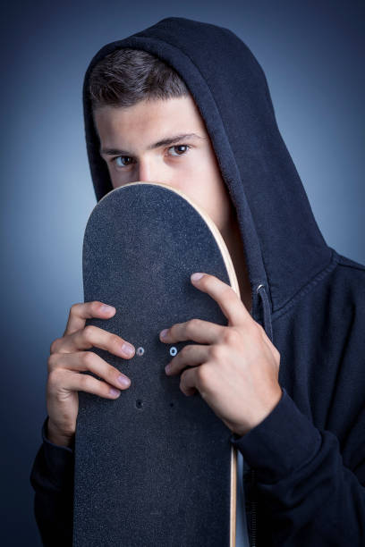 istock skateboarder with hoody 820964830