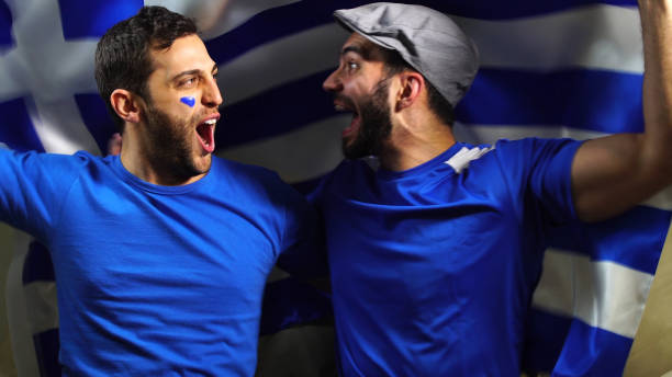 istock Greek Friends Waving Greece Flag 820965144