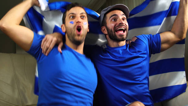 istock Greek Friends Waving Greece Flag 820965182