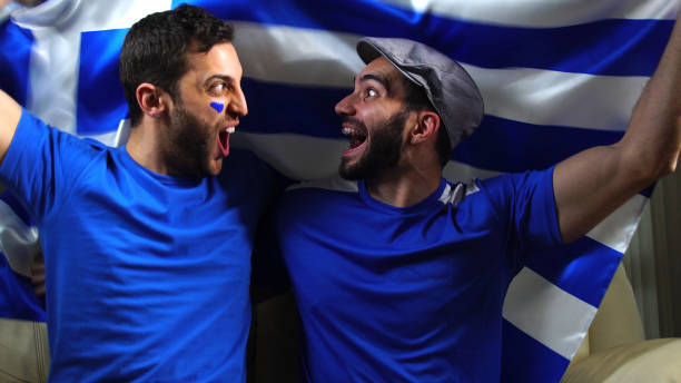 istock Greek Friends Waving Greece Flag 820965206