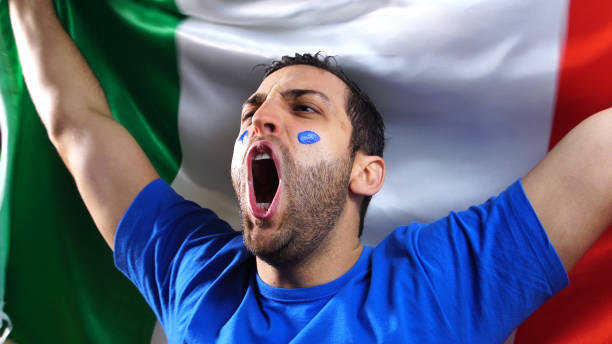 istock Italian Guy Waving Italy Flag 820965296