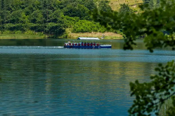 Environment of the dam, reservoir or barrage   Dushantsi at river Topolnitsa with passenger-ship,  Central Balkan mountain, Stara Planina, Bulgaria