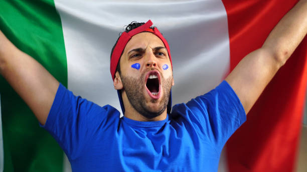 istock Italian Guy Waving Italy Flag 820965360